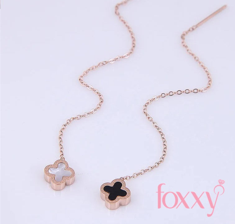 Korean temperament sweet four-leaf clover long earrings simple titanium steel earrings