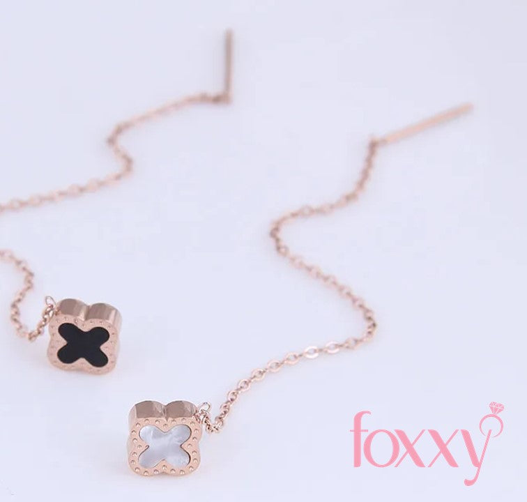 Korean temperament sweet four-leaf clover long earrings simple titanium steel earrings
