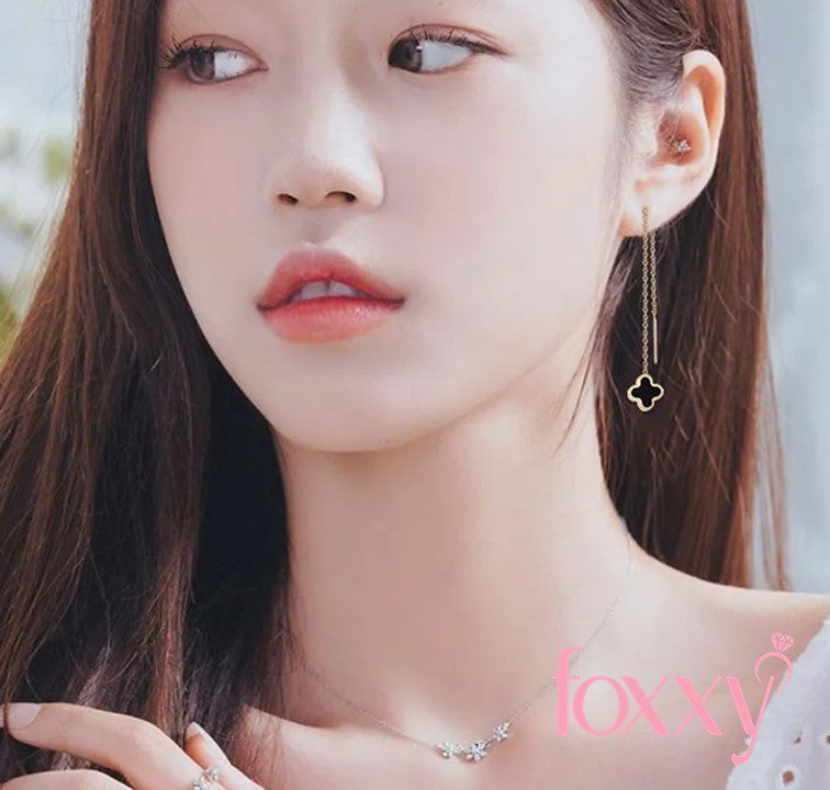 Korean temperament sweet four-leaf clover long earrings simple titanium steel earrings